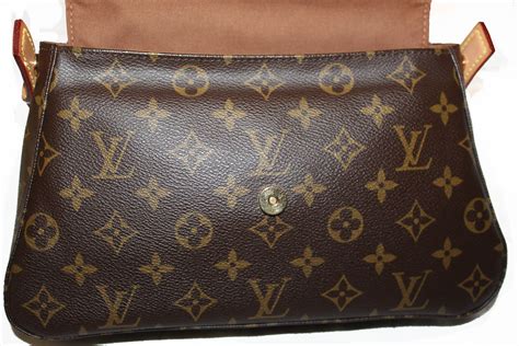 Louis Vuitton Monogram Looping Mini .